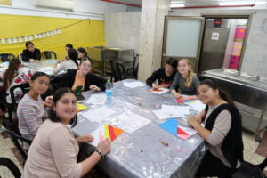 Keren Hayeled orphanage girls busy with organized crafts during Israel war time